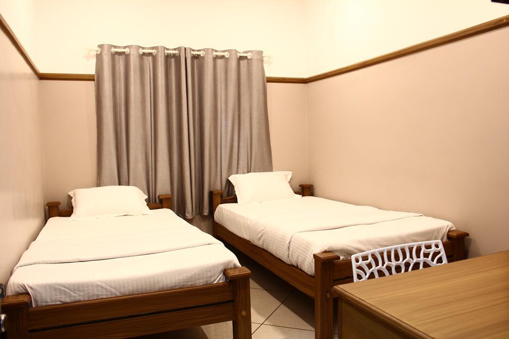 Hotel Icon Residencia Kalpetta Habitación foto