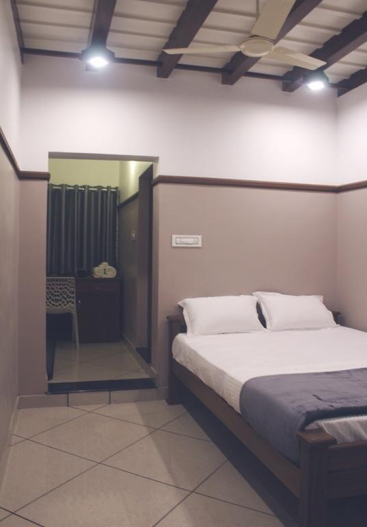 Hotel Icon Residencia Kalpetta Habitación foto